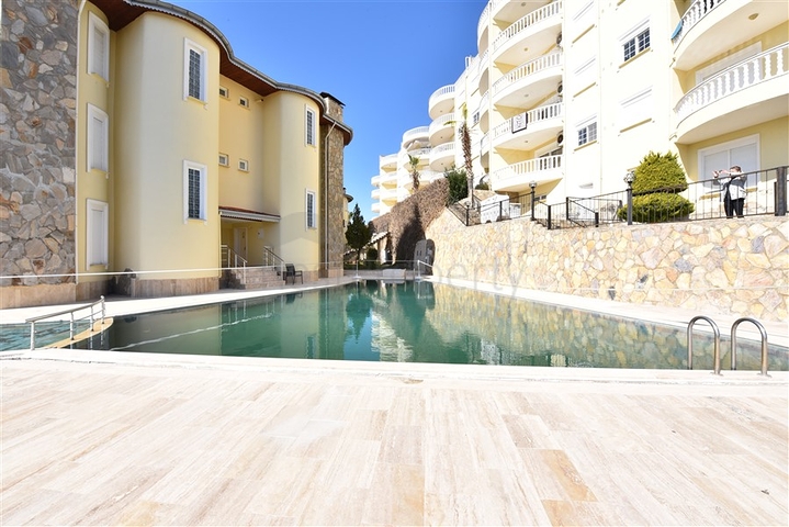 تراس واسع - شقة بسعر مناسب - تصميم غرفتين وصالة مفروشة - في افسلار / الانيا 