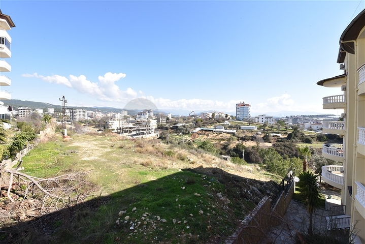 تراس واسع - شقة بسعر مناسب - تصميم غرفتين وصالة مفروشة - في افسلار / الانيا 