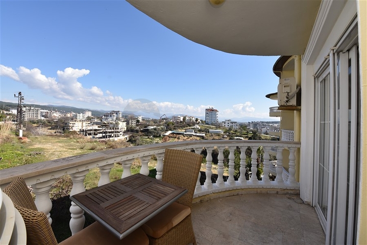 تراس واسع - شقة بسعر مناسب - تصميم غرفتين وصالة مفروشة - في افسلار / الانيا 