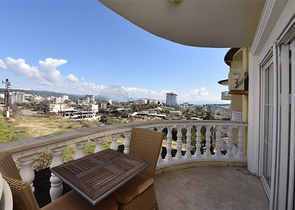 تراس واسع - شقة بسعر مناسب - تصميم غرفتين وصالة مفروشة - في افسلار / الانيا 