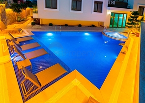 ضمن مجمع حديث في مركز الانيا - للبيع شقة غرفتين وصالة .