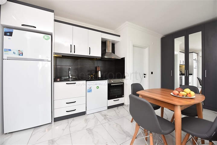 سعر اقتصادي - شقة غرفة نوم وصالة مع الاثاث - ضمن مجمع حديث - في افسلار / الانيا 