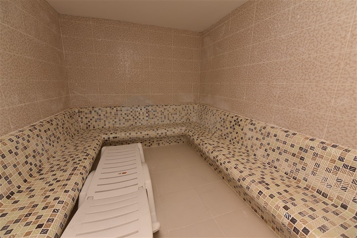 سعر اقتصادي - شقة غرفة نوم وصالة مع الاثاث - ضمن مجمع حديث - في افسلار / الانيا 