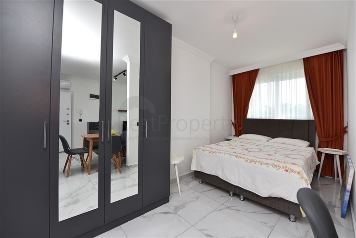 سعر اقتصادي - شقة غرفة نوم وصالة مع الاثاث - ضمن مجمع حديث - في افسلار / الانيا 