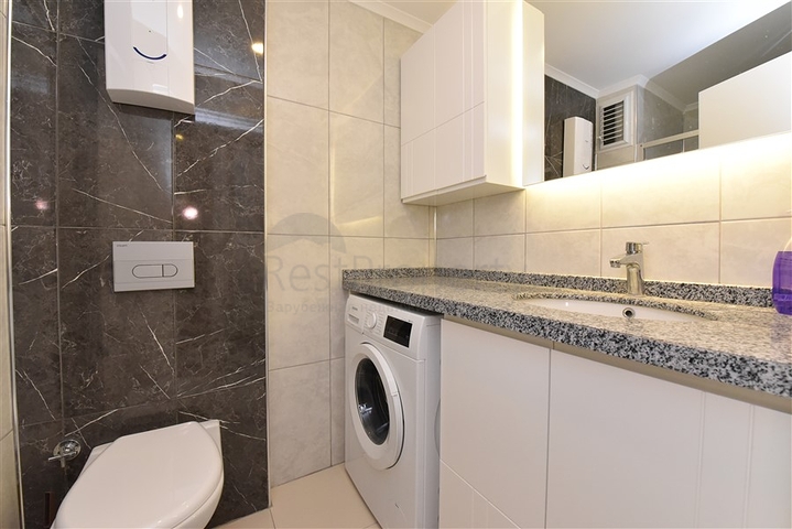 شقة ضمن مجمع جديد في افسلار - تصميم غرفة وصالة مع الاثاث - الانيا 