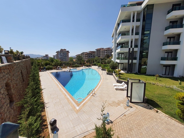 مطبخ منفصل - شقة عائلية واسعة تصميم 3 غرف وصالة - في اوبا / الانيا 