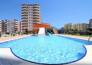 اطلالة على البحر - شقة في شارع بارباروس - تصميم غرفتين وصالة مفروشة -ضمن مجمع سكني - محمودلار/ الانيا 