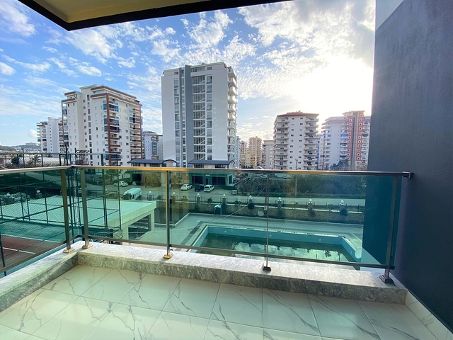 شقة فاخرة ضمن مجمع سكني - غرفتين وصالة مفروشة -في محمودلار / الانيا 