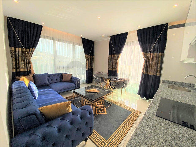 شقة فاخرة ضمن مجمع سكني - غرفتين وصالة مفروشة -في محمودلار / الانيا 