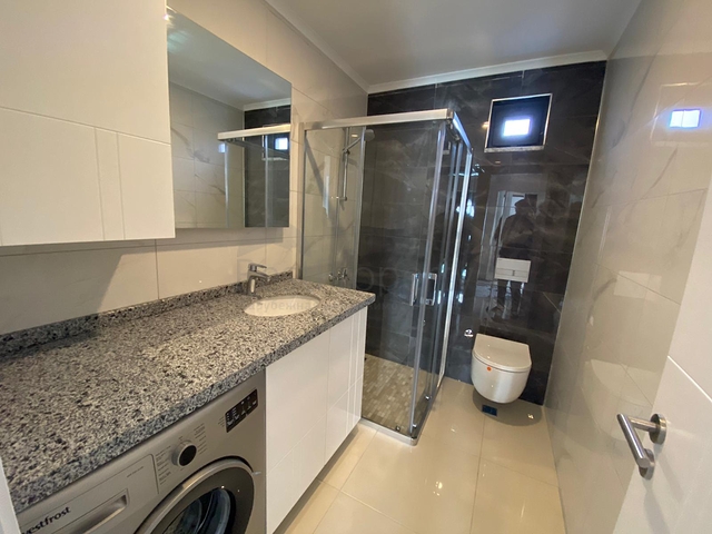 شقة فاخرة ضمن مجمع سكني - غرفتين وصالة مفروشة -في محمودلار / الانيا 