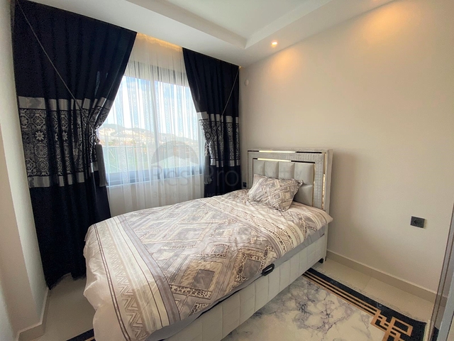 شقة فاخرة ضمن مجمع سكني - غرفتين وصالة مفروشة -في محمودلار / الانيا 