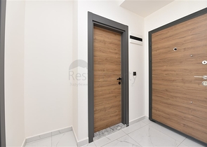 سعر مناسب - شقة غرفة وصالة جديدة -ضمن مجمع سكني في موقع ممتاز - اوبا / الانيا 