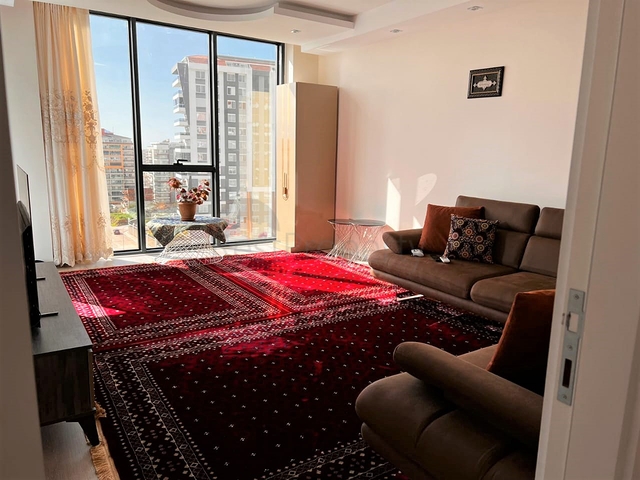 شقة غرفتين وصالة - مطبخ منفصل - ضمن مجمع جديد - في محمودلار / الانيا 