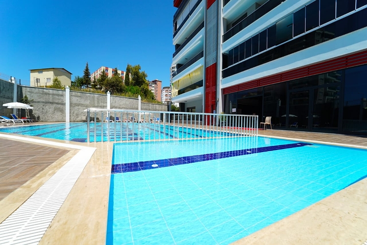 شقة غرفتين وصالة - مطبخ منفصل - ضمن مجمع جديد - في محمودلار / الانيا 