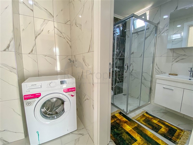 شقة زاوية - غرفتين وصالة مع مطبخ منفصل - مفروشة وضمن مجمع جديد - في ديمرتاش / الانيا 