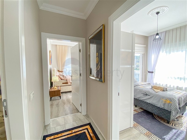 شقة زاوية - غرفتين وصالة مع مطبخ منفصل - مفروشة وضمن مجمع جديد - في ديمرتاش / الانيا 