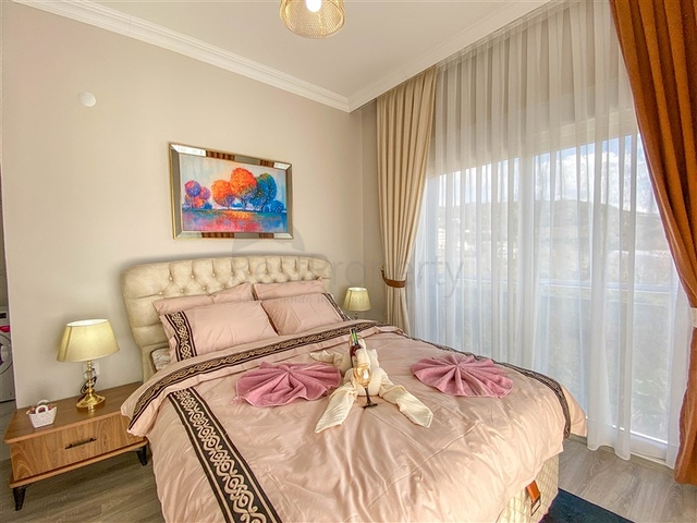 شقة زاوية - غرفتين وصالة مع مطبخ منفصل - مفروشة وضمن مجمع جديد - في ديمرتاش / الانيا 