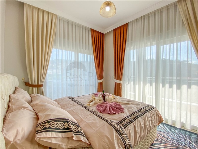 شقة زاوية - غرفتين وصالة مع مطبخ منفصل - مفروشة وضمن مجمع جديد - في ديمرتاش / الانيا 