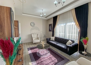 شقة زاوية - غرفتين وصالة مع مطبخ منفصل - مفروشة وضمن مجمع جديد - في ديمرتاش / الانيا 