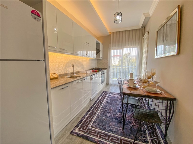 شقة عائلية غرفتين وصالة - مطبخ منفصل - مجمع سكني حديث - في منطقة ديمرتاش / الانيا 