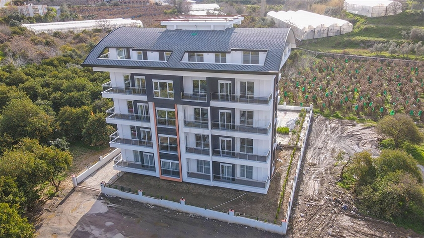 شقة عائلية غرفتين وصالة - مطبخ منفصل - مجمع سكني حديث - في منطقة ديمرتاش / الانيا 