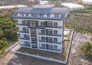 شقة عائلية غرفتين وصالة - مطبخ منفصل - مجمع سكني حديث - في منطقة ديمرتاش / الانيا 