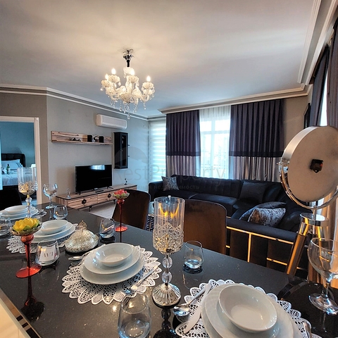 شقة انيقة - تصميم غرفة وصالة مفروشة - في مركز الانيا 