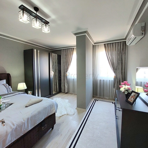 شقة انيقة - تصميم غرفة وصالة مفروشة - في مركز الانيا 