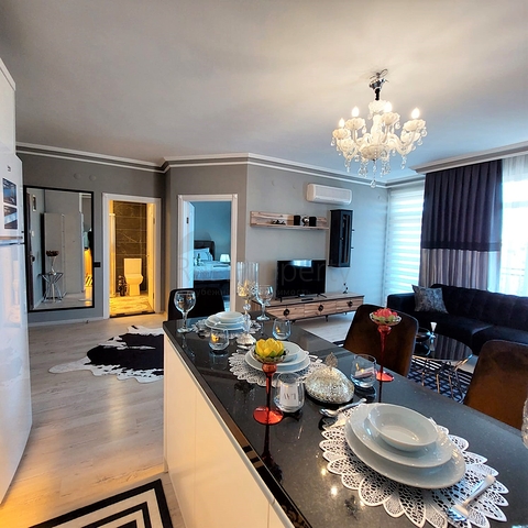 شقة انيقة - تصميم غرفة وصالة مفروشة - في مركز الانيا 