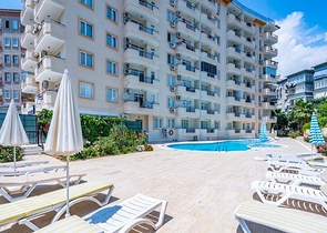 شقة انيقة - تصميم غرفة وصالة مفروشة - في مركز الانيا 