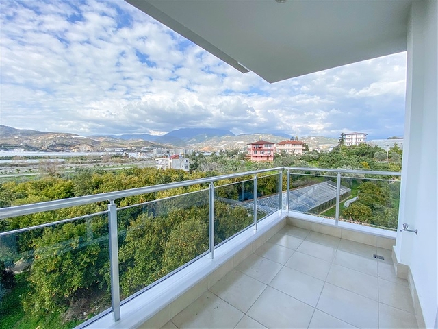 اطلالة على الطبيعة الخضراء - شقة انيقة ضمن مجمع جديد - تصميم غرفتين وصالة مع مطبخ منفصل - في ديمرتاش / الانيا 