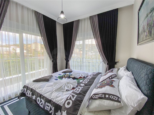 اطلالة على الطبيعة الخضراء - شقة انيقة ضمن مجمع جديد - تصميم غرفتين وصالة مع مطبخ منفصل - في ديمرتاش / الانيا 