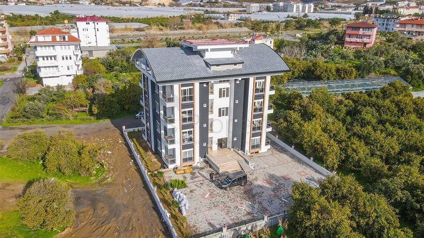 اطلالة على الطبيعة الخضراء - شقة انيقة ضمن مجمع جديد - تصميم غرفتين وصالة مع مطبخ منفصل - في ديمرتاش / الانيا 