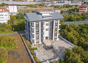 اطلالة على الطبيعة الخضراء - شقة انيقة ضمن مجمع جديد - تصميم غرفتين وصالة مع مطبخ منفصل - في ديمرتاش / الانيا 