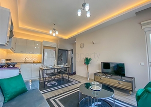 شقة غرفة وصالة مفروشة -ضمن مجمع جديد في ديمرتاش / الانيا 