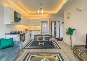 شقة غرفة وصالة مفروشة -ضمن مجمع جديد في ديمرتاش / الانيا 