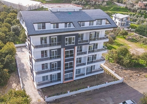 شقة غرفة وصالة مفروشة -ضمن مجمع جديد في ديمرتاش / الانيا 