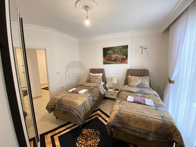 شقة غرفتين وصالة اثاث جديد - في محمودلار / الانيا 