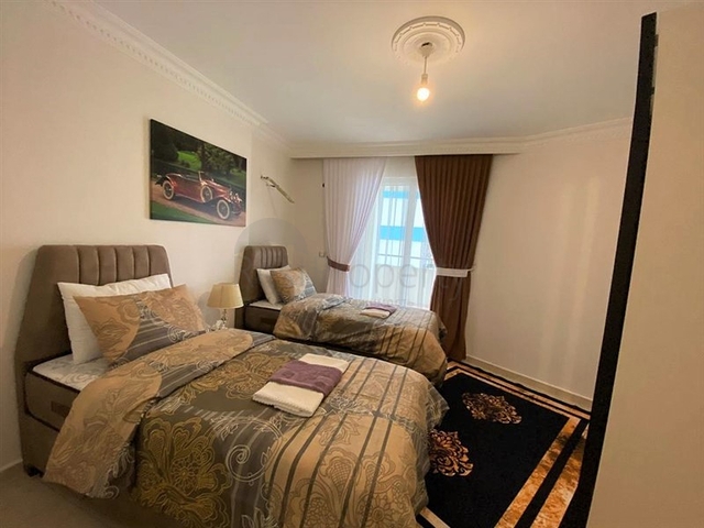 شقة غرفتين وصالة اثاث جديد - في محمودلار / الانيا 