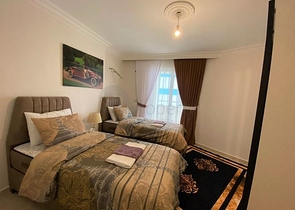 شقة غرفتين وصالة اثاث جديد - في محمودلار / الانيا 