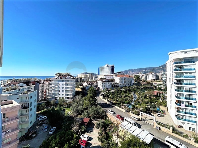 اطلالة بحر وقلعة - شقة واسعة غرفتين وصالة مفروشة - في منطقة توسمور المركزية / الانيا 