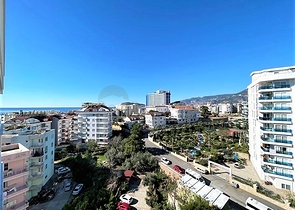 اطلالة بحر وقلعة - شقة واسعة غرفتين وصالة مفروشة - في منطقة توسمور المركزية / الانيا 