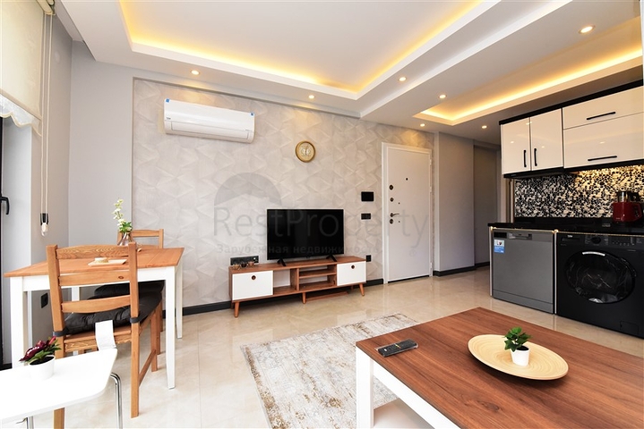 شقة جديدة - غرفة وصالة مفروشة -ضمن مجمع سكني في مركز الانيا 