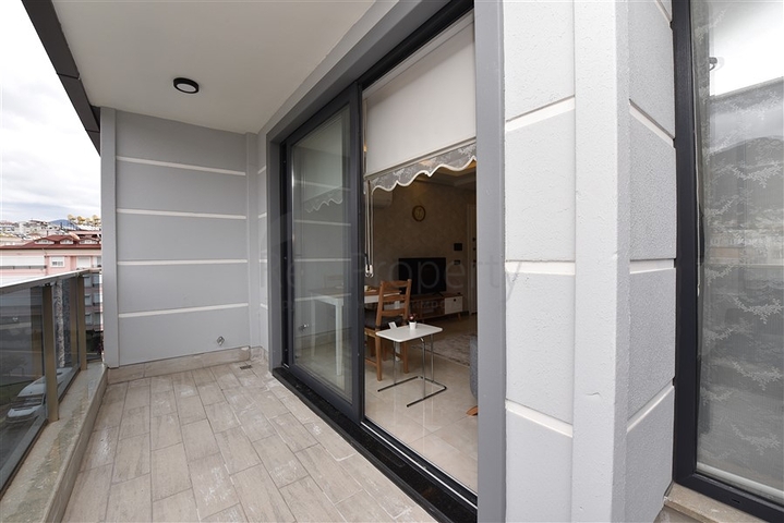 شقة جديدة - غرفة وصالة مفروشة -ضمن مجمع سكني في مركز الانيا 