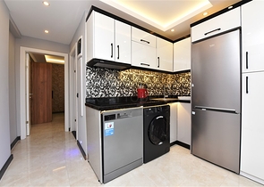 شقة جديدة - غرفة وصالة مفروشة -ضمن مجمع سكني في مركز الانيا 