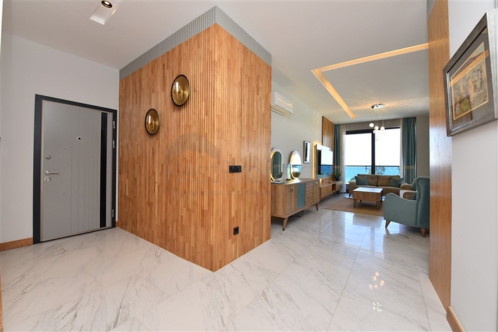 صف اول على البحر - شقة فاخرة غرفتين وصالة -ضمن مجمع 5 نجوم في كارجيجاك / الانيا 