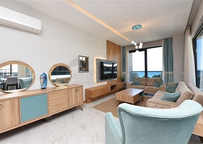 صف اول على البحر - شقة فاخرة غرفتين وصالة -ضمن مجمع 5 نجوم في كارجيجاك / الانيا 