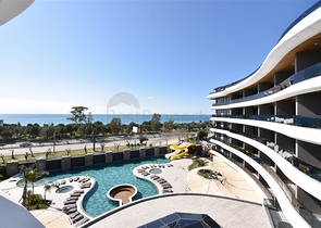 صف اول على البحر - شقة فاخرة غرفتين وصالة -ضمن مجمع 5 نجوم في كارجيجاك / الانيا 