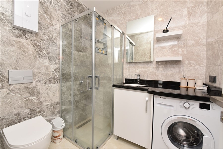 شقة غرفتين وصالة مفروشة -ضمن مجمع سكني حديث -في مركز الانيا 