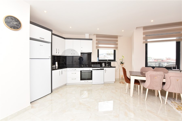 شقة غرفتين وصالة مفروشة -ضمن مجمع سكني حديث -في مركز الانيا 